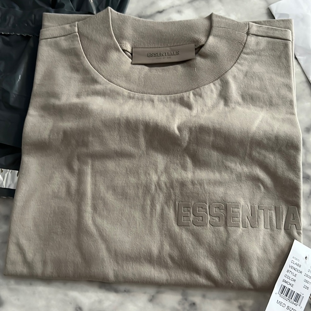 Essential women tshirt in the color smoke size medium